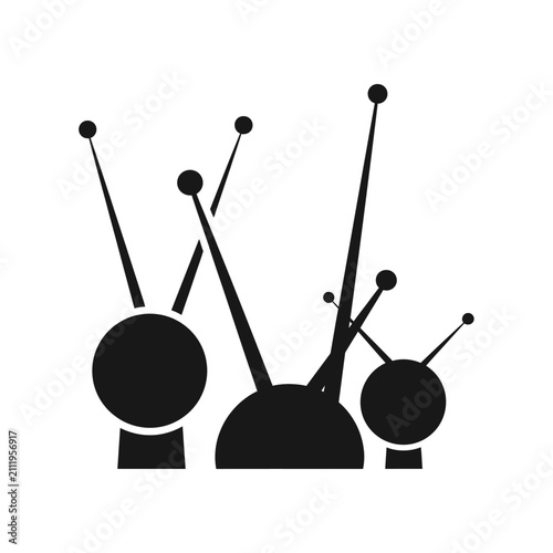 Abstract black antenna-like shapes with thin stems and circular bases.