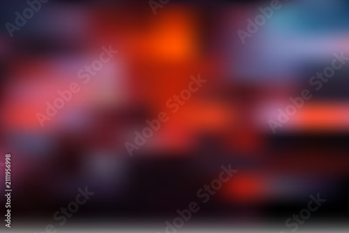 Abstract blurred glowing red and orange dark background