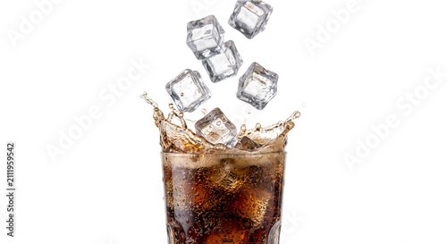 Quadro su tela Ice cubes splashing into a glass of cola with bubbles and foam