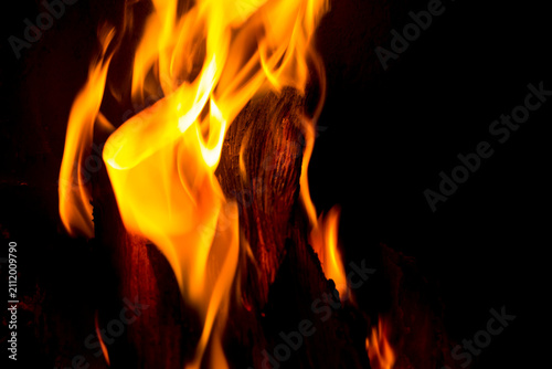 Fire burning in a fireplace. Abstract art from fire.