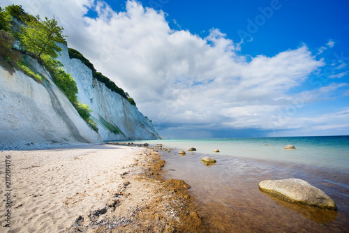 Beach by Møns Klint cliffs along the eastern coast of the Danish island of Møn in the Baltic Sea