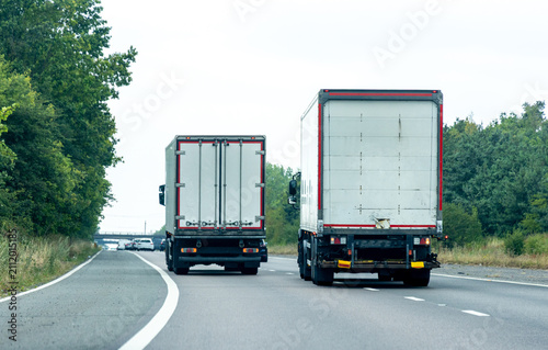 Heavy Goods Vehicles Transporting Freight On UK Motorway