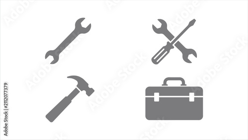 Tool silhouettes including wrench hammer screwdriver and toolbox on a white background adjustable spanner