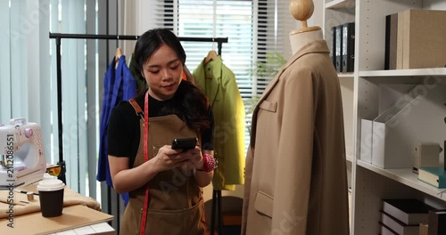 Fashion designer creating garment patterns, measuring fabric, inspecting clothing quality, and preparing apparel in a professional studio for tailoring, production, and fashion design workflow.