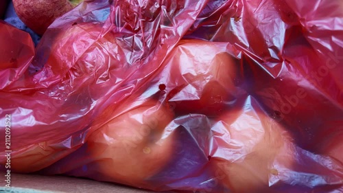 fresh red apples opening in fruit market , slow mo cinematic view of apples from box