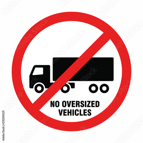 Prohibition sign indicating no oversized vehicles allowed, featuring a black semi-truck silhouette within a red circle and diagonal line, with text.