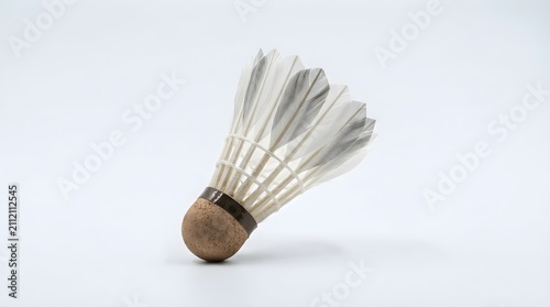 Badminton shuttlecock on white background. Professional feather birdie for sports games.