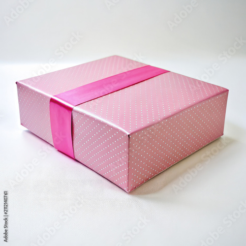 Pink Box With Ribbon on White Background
