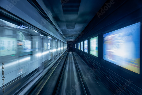Photography POV Subway Train Moving Through Lit Tunnel with Dynamic Light Effects, Shanghai,
