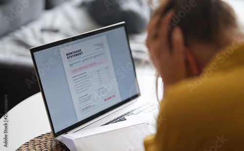 Canvas Print Stressed woman having financial problems with paying bills.