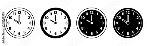 Canvastavla Set Of Four Classroom Clocks Showing Different Times.