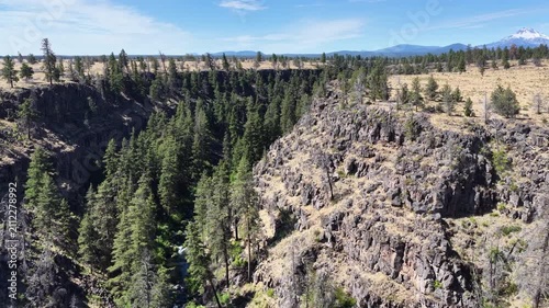 Over millennia Mill Creek has carved a 230-foot deep canyon on the Central Oregon plateau between Bend and Portland. This rugged yet scenic area of high desert is part of the Warm Springs reservation.