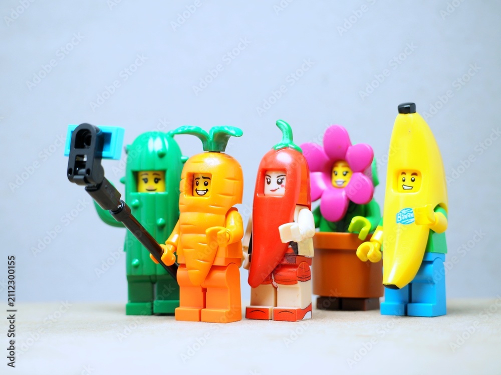 Fototapeta premium Indonesia - May 9, 2023 : Mini toy of Lego at table with blurred background. Miniature photography concept design.