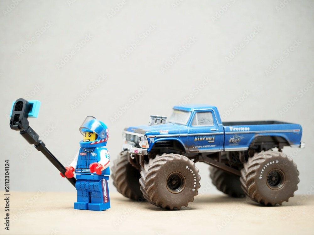 Fototapeta premium Indonesia - May 3, 2023 : Mini toy at table with blurred background. Miniature photography concept design.