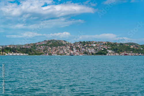 Panoramic view of coastal residential hill along Bosphorus on sunny day in İstanbul, Turkey