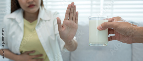 Принти на полотні Milk allergens, woman confused milk, runny stuffy sore nose suffer from intolerance allergy trigger symptoms