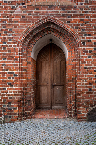 Konstfotografi Historic Gothic church door in the Heilig-Geist Church, Wittstock/Dosse, Germany