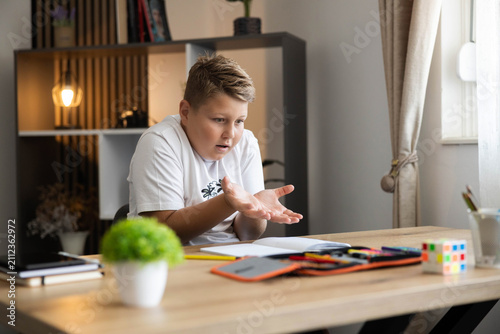 Cuadro en lienzo Young student struggling with difficult school tasks, experiencing frustration a