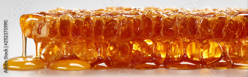 Fresh honeycomb is ready for tasting in a kitchen setting during daylight
