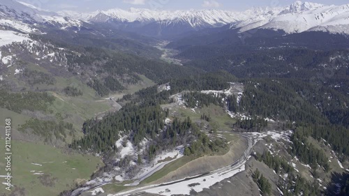A drone video of the Caucasus Mountains, the Dzhily‑Su Valley, and the Pkhia Pass, Arkhyz, Russia, 2026.

