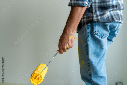 Photography Man painting wall yellow photo