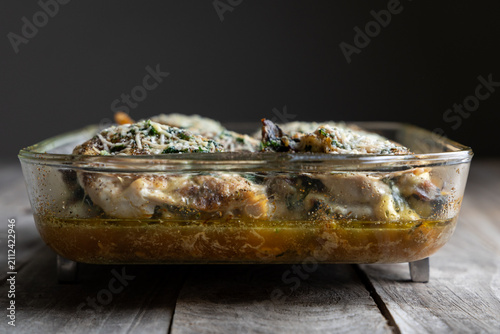 Bacon Spinach and Gouda Stuffed Chicken Breasts in Glass Baking Dish
