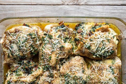 Bacon Spinach and Gouda Stuffed Chicken Breasts in Glass Baking Dish