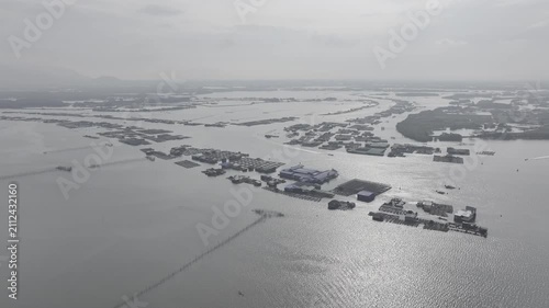 Aerial drone view of oyster farming rafts on the river in Long Son, near Ho Chi Minh City, Vietnam.