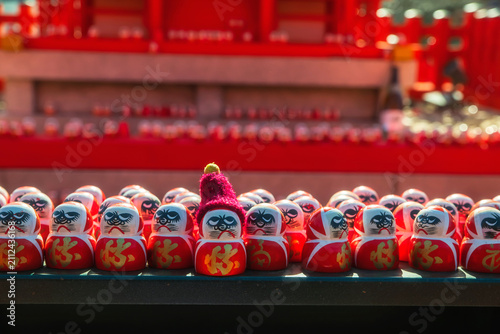 daruma dolls with red scarf cap at red shrine of Katsuo-ji temple, Minoh