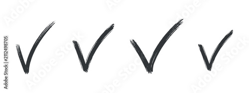 Four hand drawn check marks with textured strokes on a transparent surface