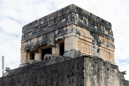 Принти на полотні Upper view of the Jaguar Temple structure with stone columns and serpent heads a