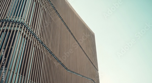Modern Building Facade with Unique Wave Pattern and Vertical Slats