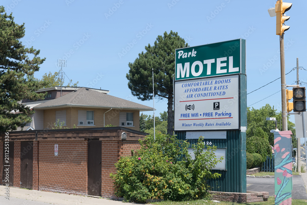 Obraz premium road-side pylon sign outside Park Motel located at 3126 Kingston Rd, Scarborough, Toronto