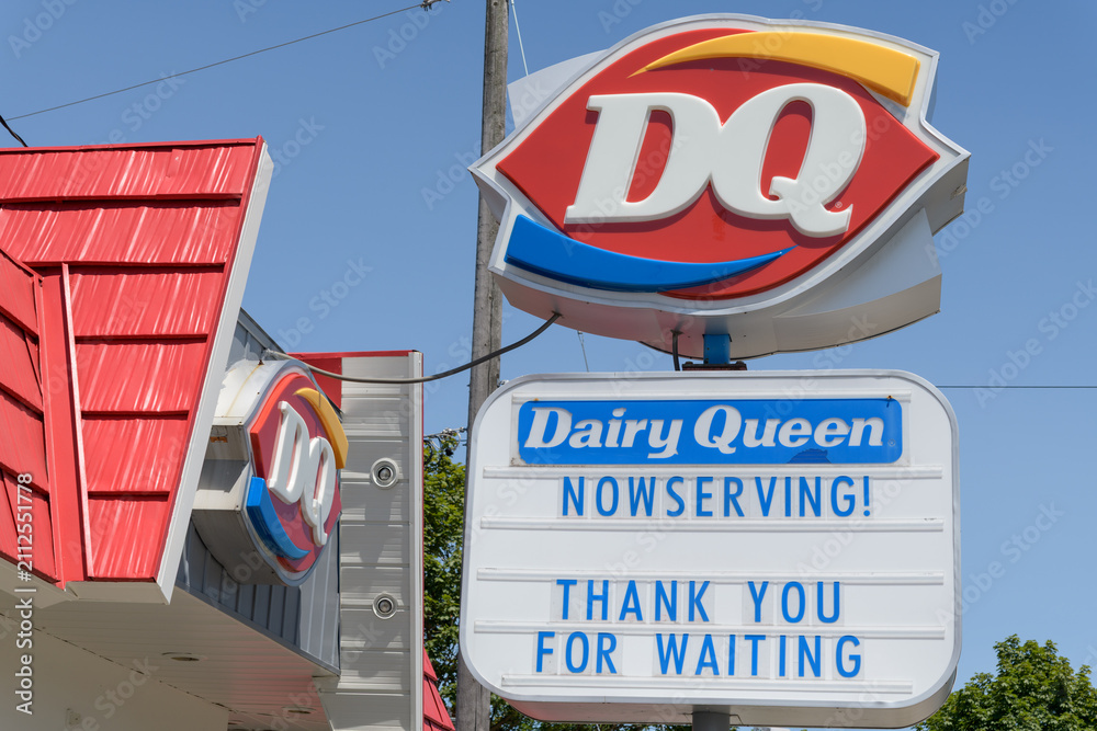 Obraz premium shaped logo signage outside Dairy Queen or DQ, an ice cream shop and fast food quick-service restaurant, located here at 2882 Kingston Rd, Scarborough, Toronto