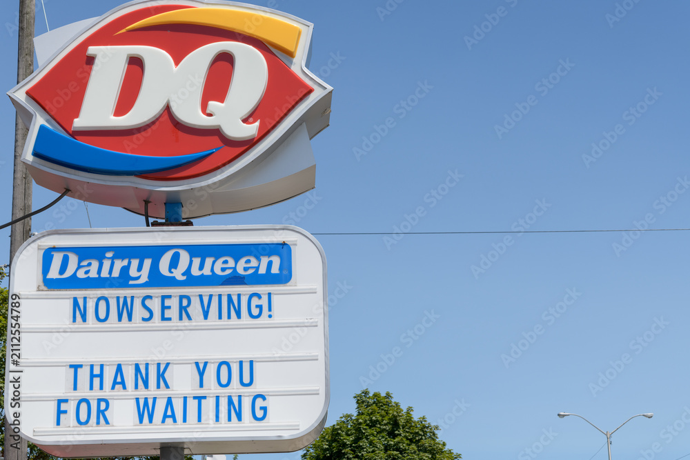 Obraz premium shaped logo signage outside Dairy Queen or DQ, an ice cream shop and fast food quick-service restaurant, located here at 2882 Kingston Rd, Scarborough, Toronto