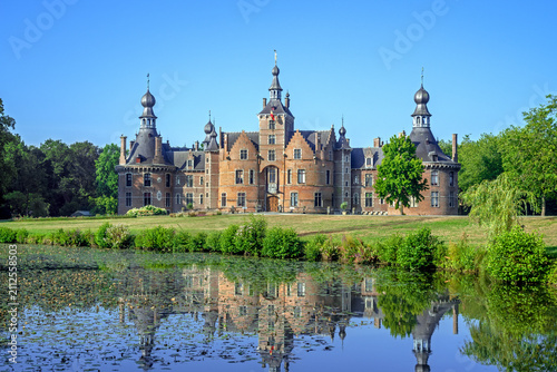 Ooidonk Castle / Kasteel van Ooidonk, 16th century Flemish Renaissance moated castle at Sint-Maria-Leerne in summer, Deinze, East Flanders, Belgium