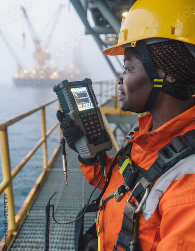 Offshore Energy Engineer Monitoring Telemetry on Rig