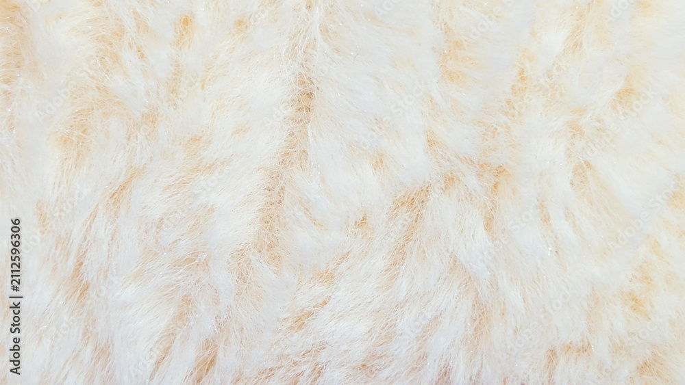 Fototapeta premium close up of fluffy white faux fur soft plush texture