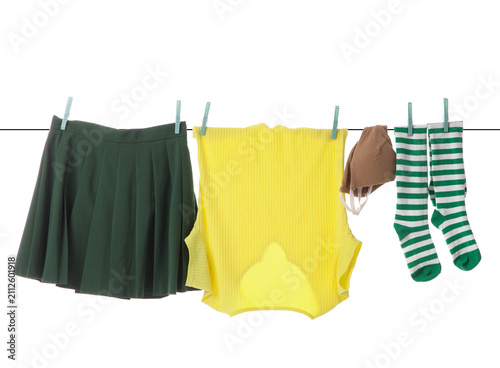 Green pleated skirt, yellow...