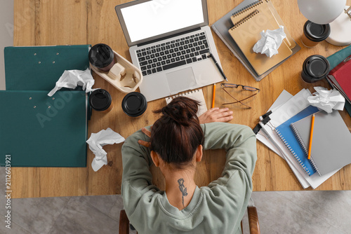 Overwhelmed young woman sle...