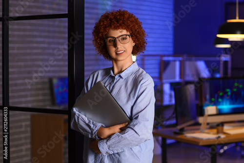 Smiling young businesswoman...