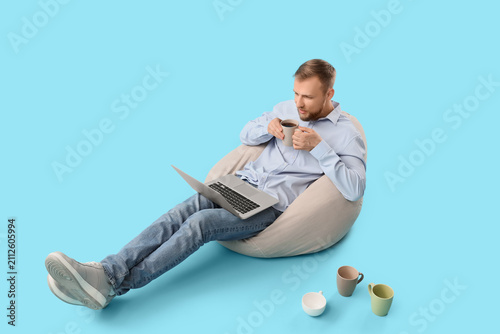 Young man in a casual shirt...