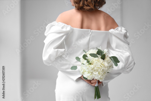 Beautiful bride with flower...
