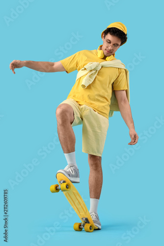Handsome young man in yello...