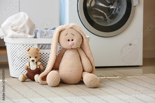Laundry basket with toys on...