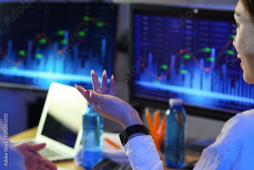 Female trader working in of...