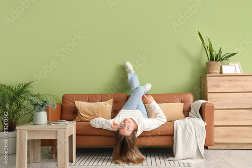 Beautiful young woman lying...