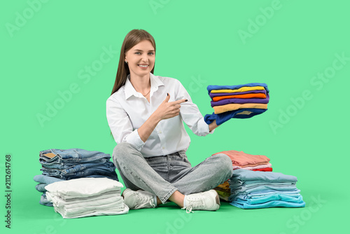 Young woman pointing at sta...