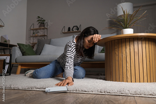 Depressed young woman with ...