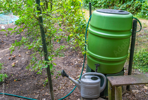 Plastic Rain Barrel with Hose and Watering Can for Rainwater Storage in The Garden
